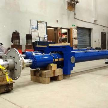 Two long stroke dam gate hoist hydraulic cylinders with engineered gimbal and liquid-tight bulkhead rod penetrations